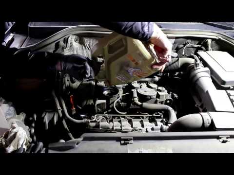 Volkswagen Tiguan Фольксваген Тигуан 2009 год Замена масла и фильтров в двигателе